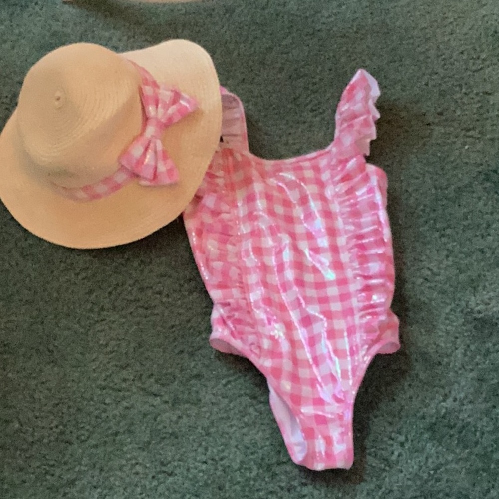 Girls Swimsuit with matching hat.